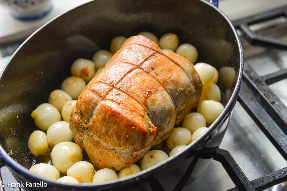Arrosto di maiale con cipolline
